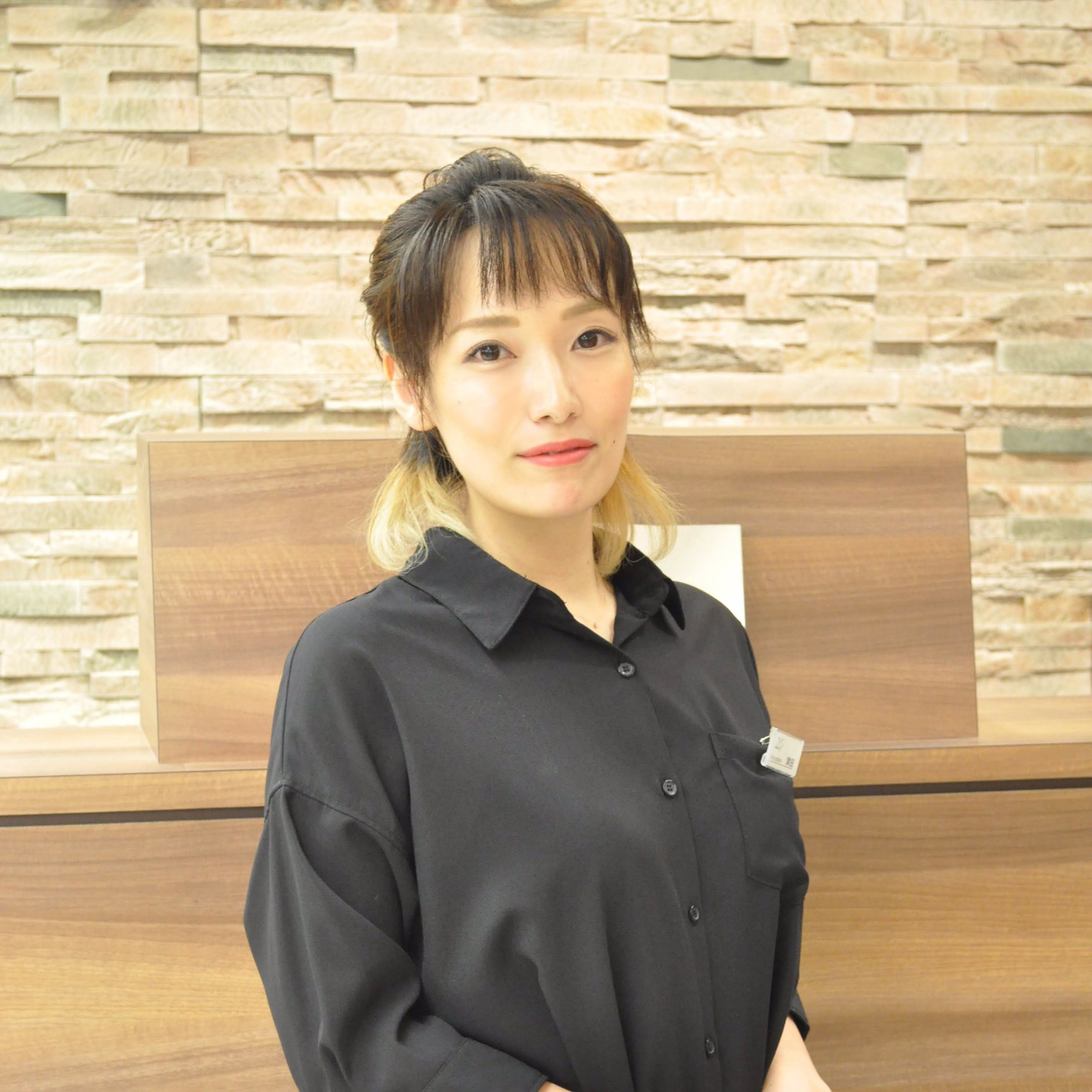 津田 佳央里